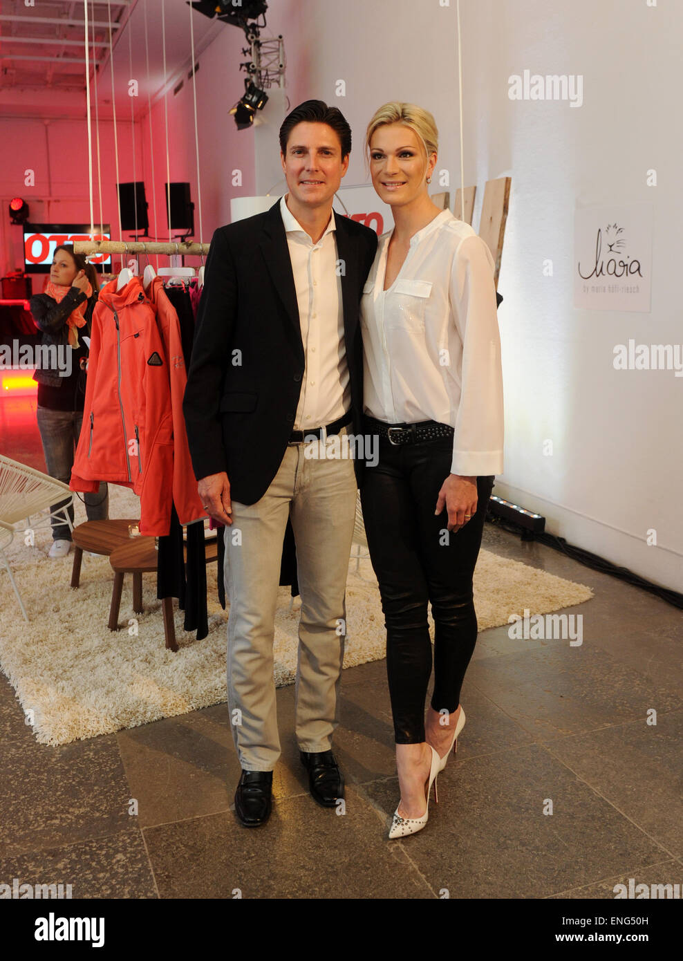 Munich, Germany. 04th May, 2015. Former ski racer Maria Hoefl-Riesch and her husband Marcus Hoefl pose during an event of the catalog company Otto in Munich, Germany, 04 May 2015. Hoefl-Riesch and Otto have a cooperation for a joint clothing line. Photo: TOBIAS HASE/dpa/Alamy Live News Stock Photo