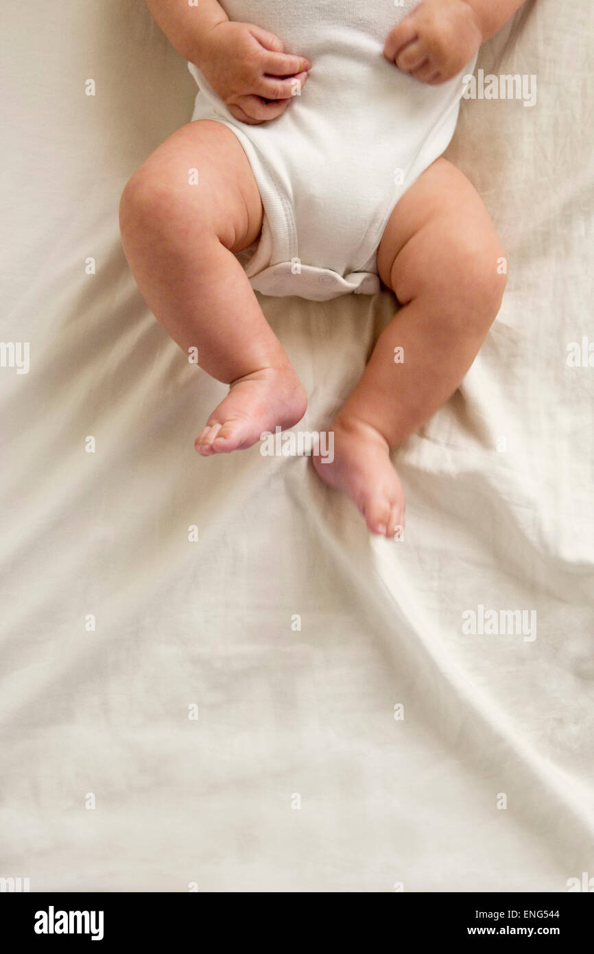 Close up of legs of mixed race baby boy Stock Photo