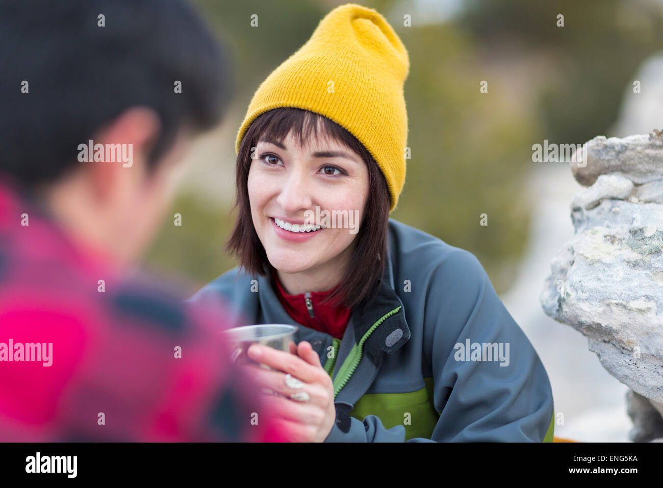 Couple drinking coffee outdoors Stock Photo