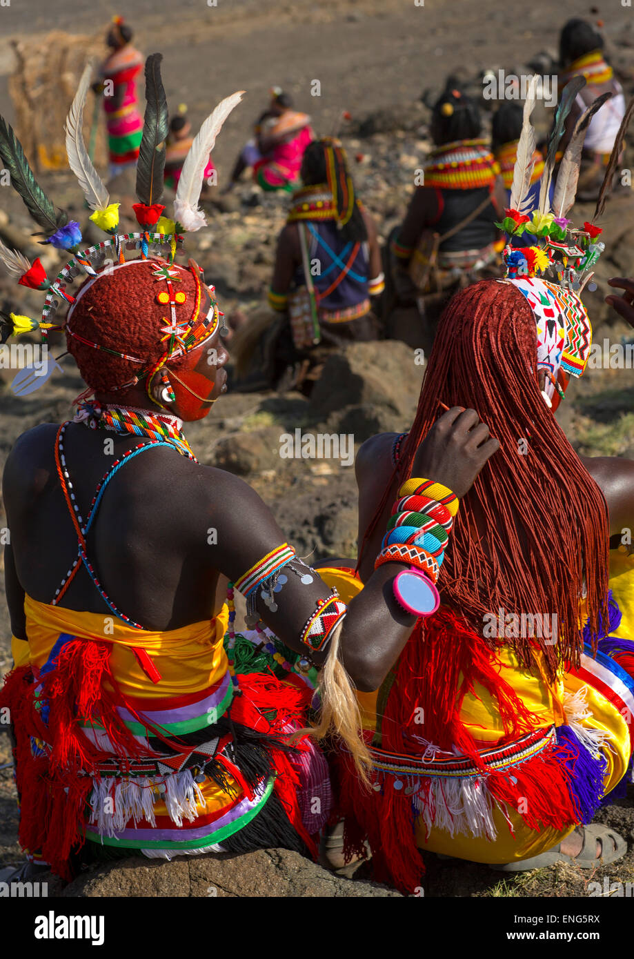 Rendille Warrior Taking Care The Ochred Braided Hair Of A Friend, Turkana Lake, Loiyangalani, Kenya Stock Photo