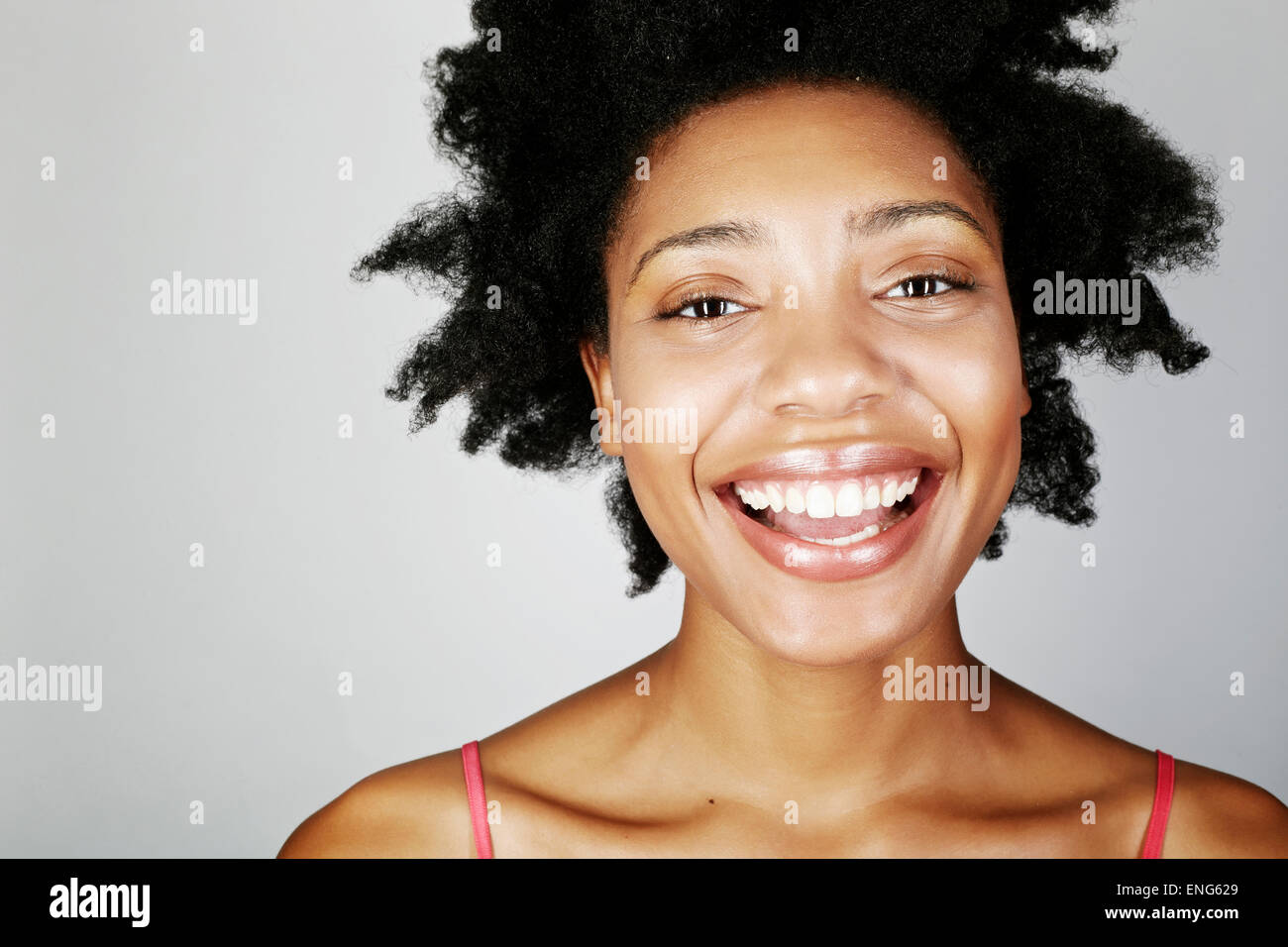 Close up of face of laughing black woman Stock Photo