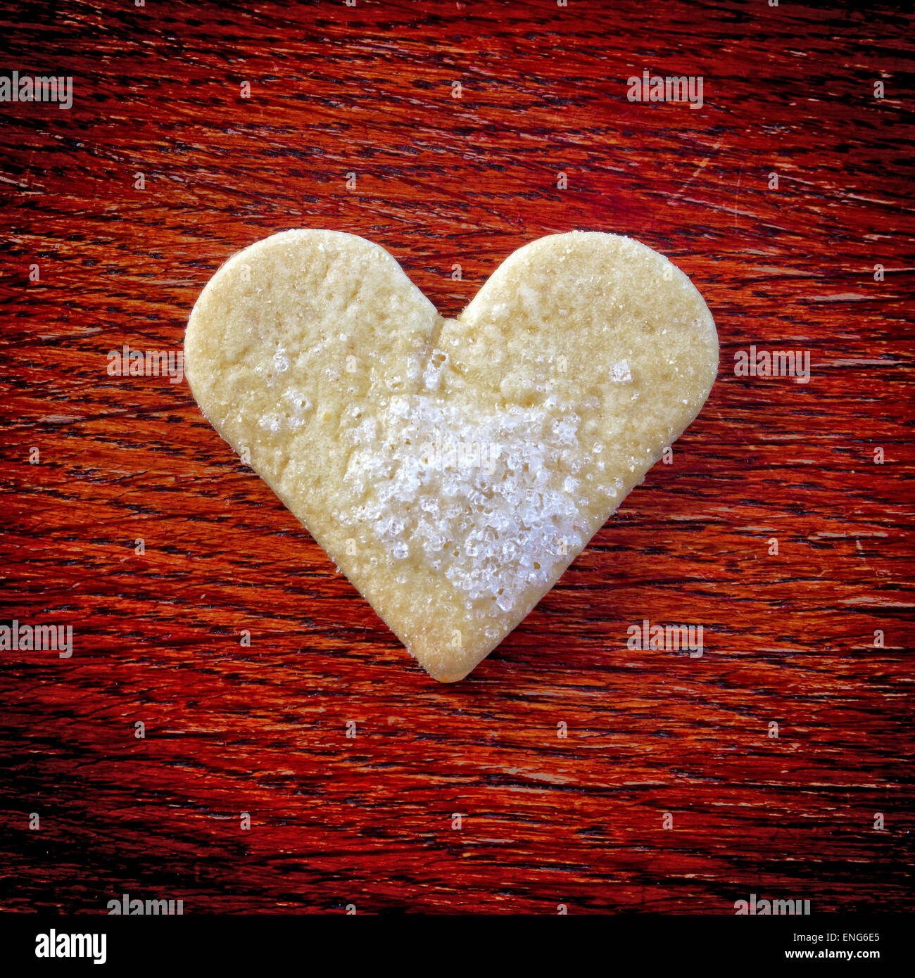 Heart of the cookies and the wooden background Stock Photo - Alamy