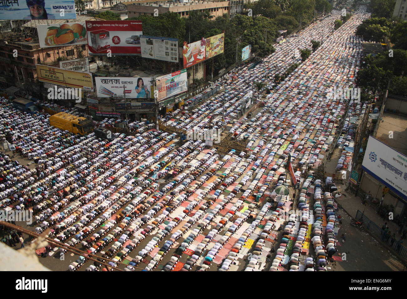 Bangladeshi supporters of the Islamic political party, Islami Andolan Bangladesh, offer Friday prayers on the streets of Dhaka. Stock Photo