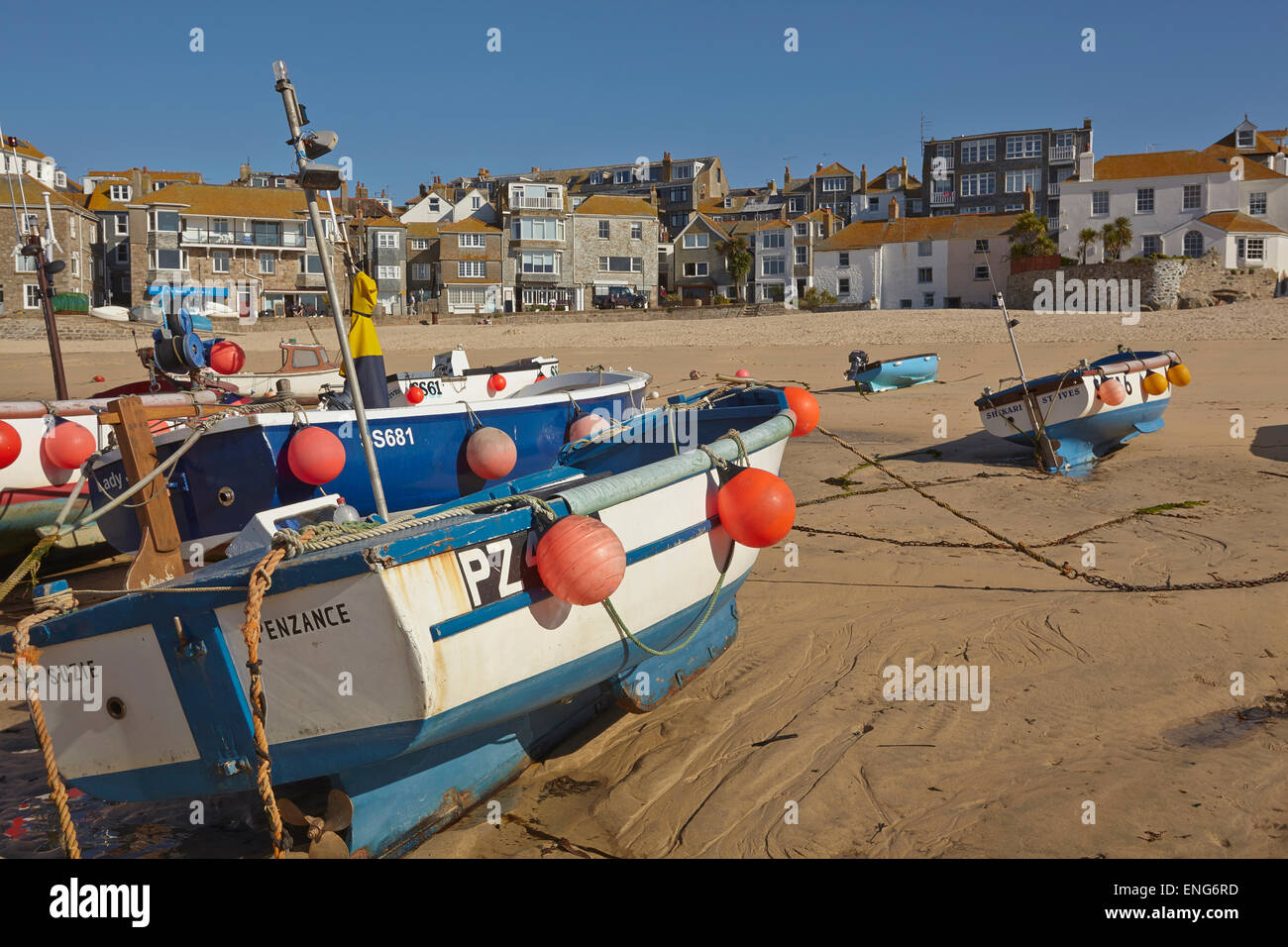 Fishing boat in the harbour, seen at low tide, in St Ives, Cornwall, Great Britain. Stock Photo