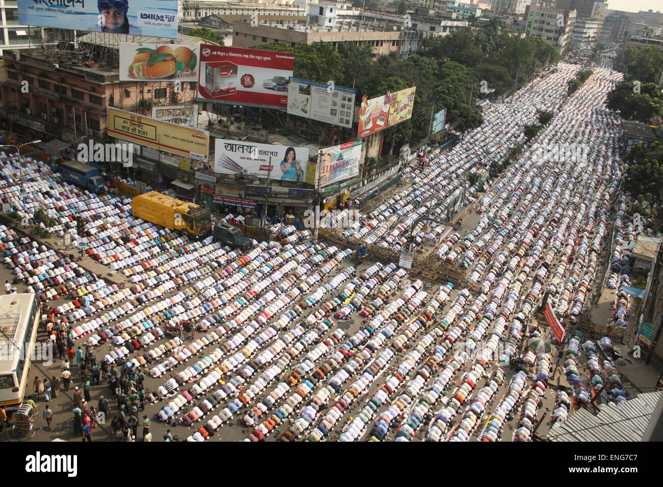 Bangladeshi supporters of the Islamic political party, Islami Andolan Bangladesh, offer Friday prayers on the streets of Dhaka. Stock Photo