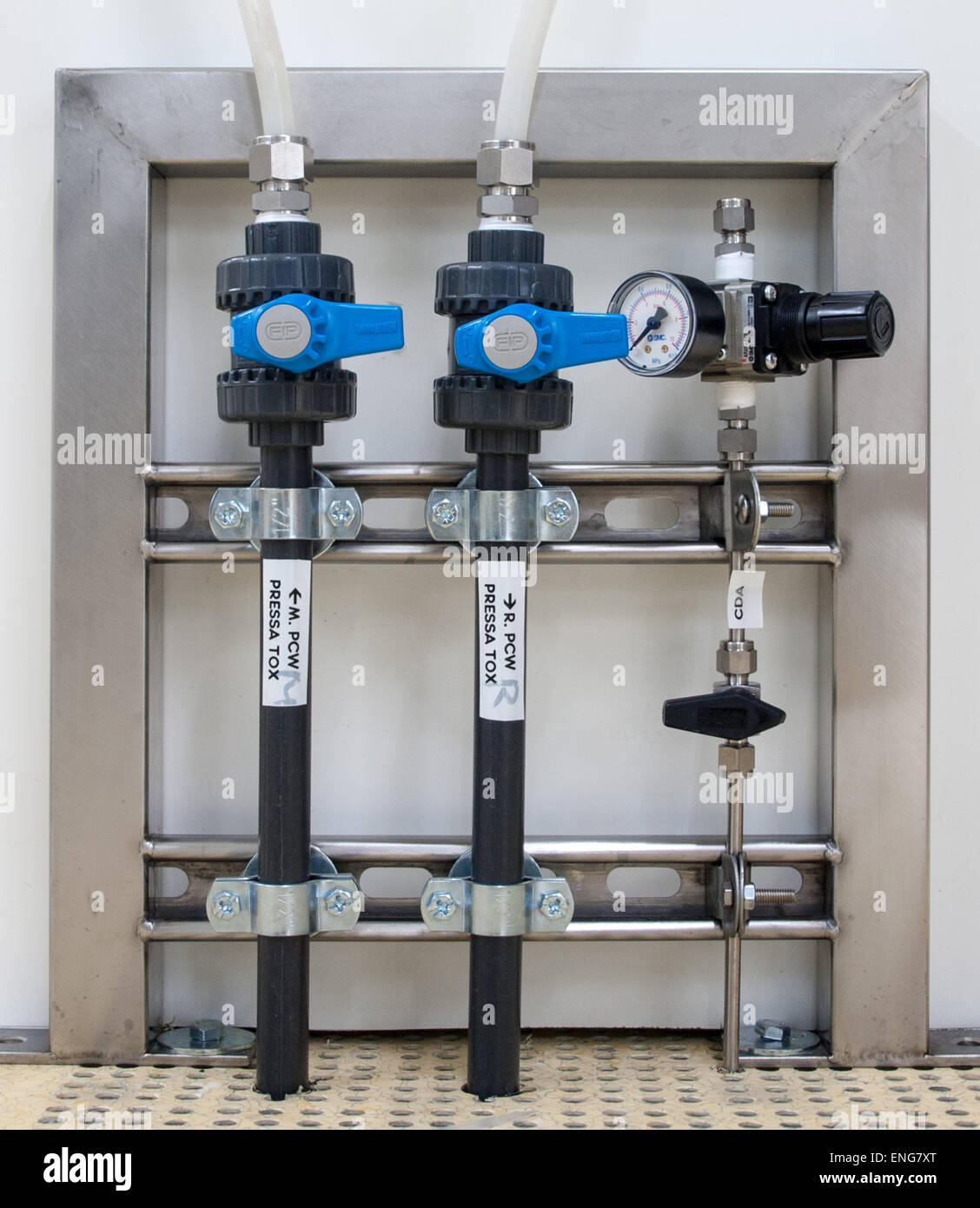 points of vacuum and compressed air with analogue manometer Stock Photo