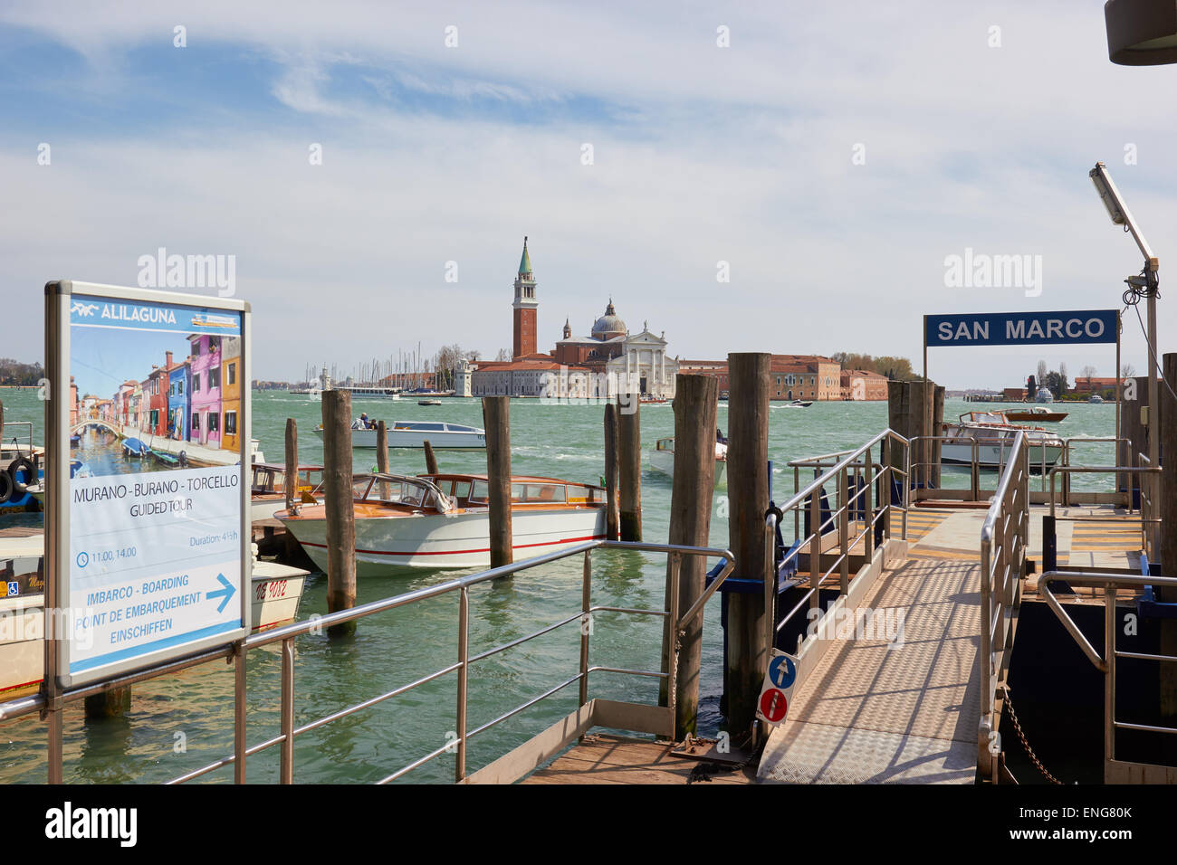 Embarkation point for boat trips to the Venetian lagoon islands with San Giorgio Maggiore in background Venice Veneto Italy Stock Photo