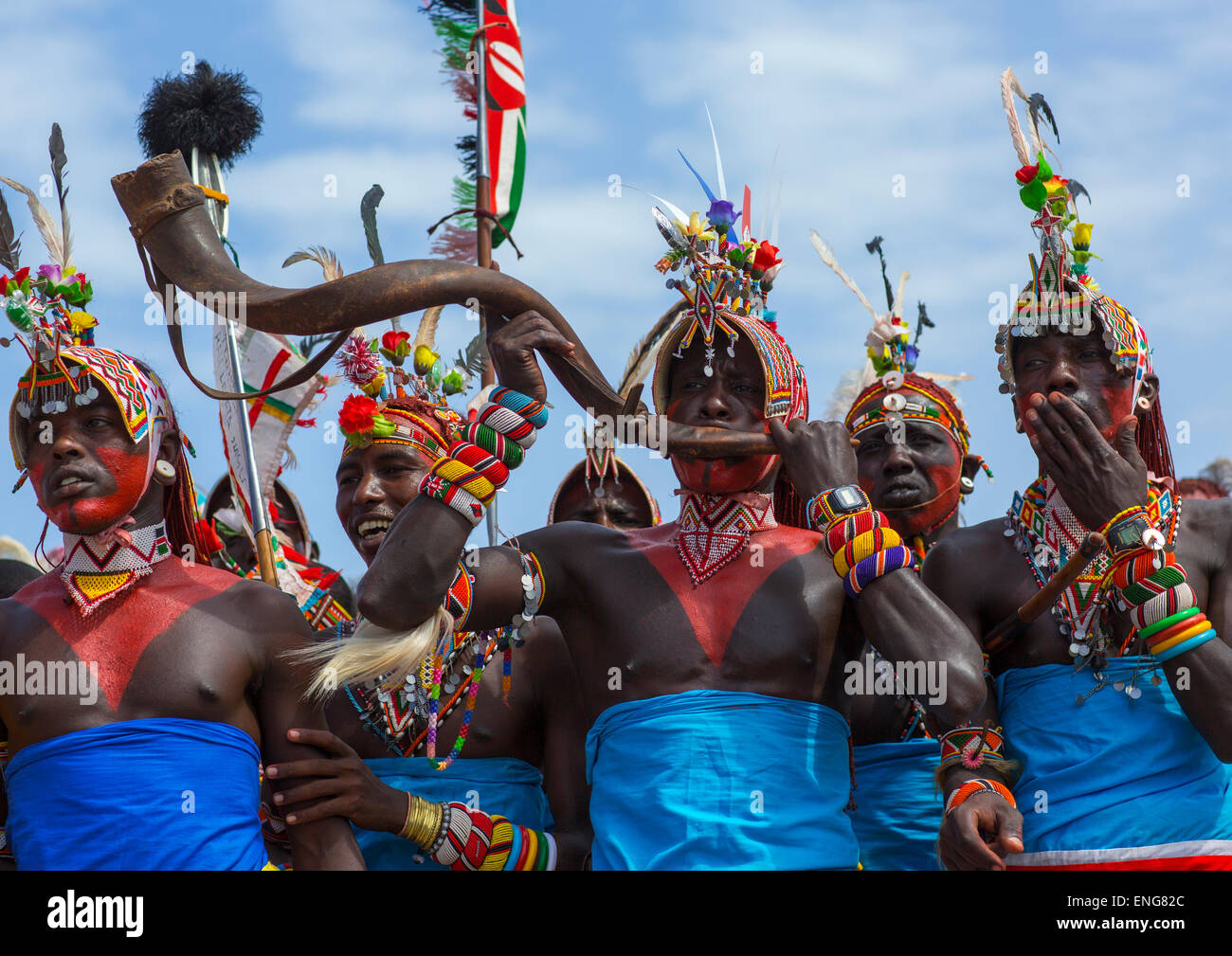Rendille Tribesmen Blowing In A Horn, Turkana Lake, Loiyangalani, Kenya Stock Photo