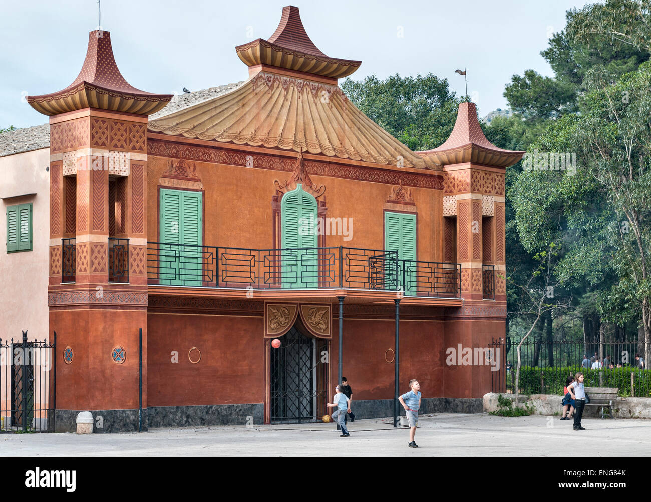The Palazzina Cinese, Palermo, Sicily, built in the 'Chinese' style in 1799. Children playing at the entrance Stock Photo
