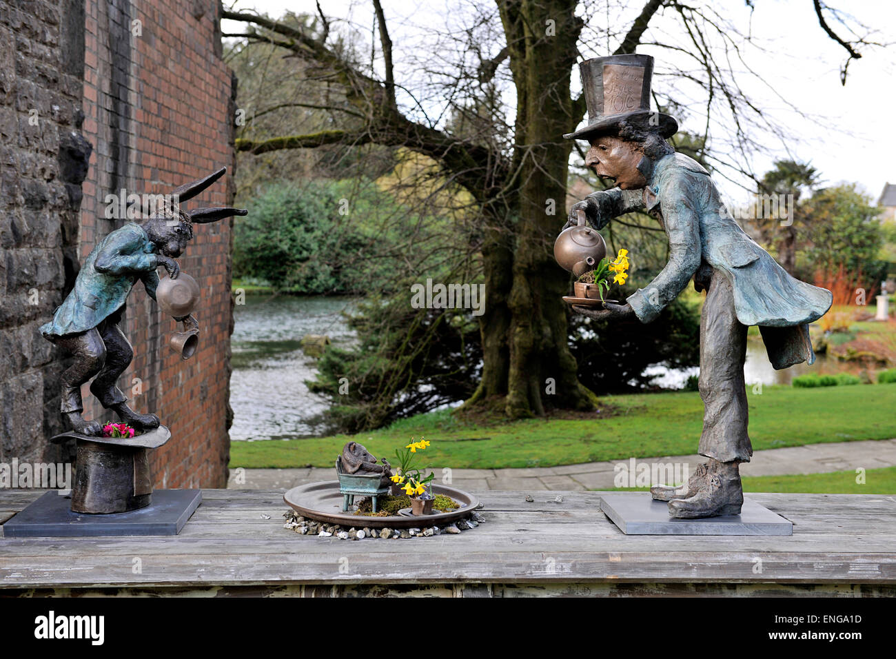 Figures from Alice in Wonderland in Kilver Court Gardens, Shepton Mallet, Somerset, owned by Roger and Monty Saul. Stock Photo