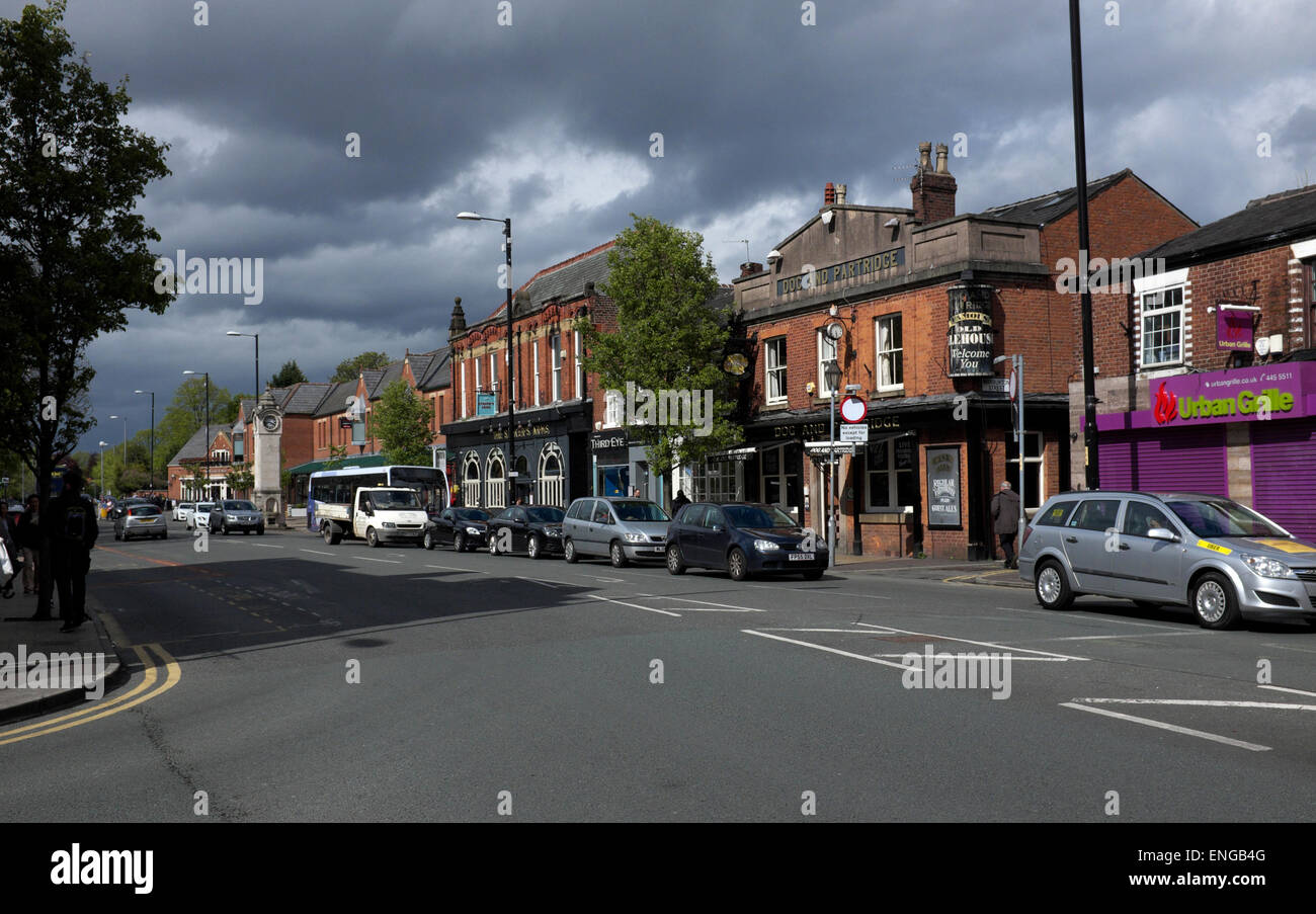 afternoon traffic on wilmslow road, didsbury, manchester Stock Photo
