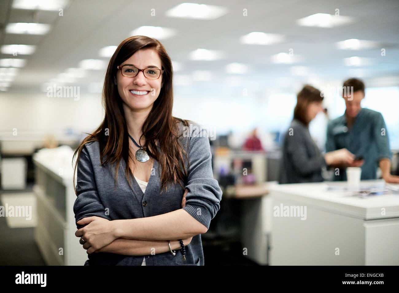 Woman with folded arms hi-res stock photography and images - Alamy