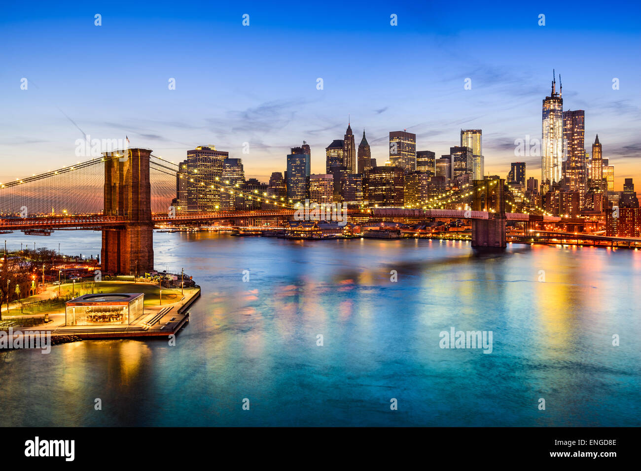 New York City, USA skyline over East River and Brooklyn Bridge. Stock Photo