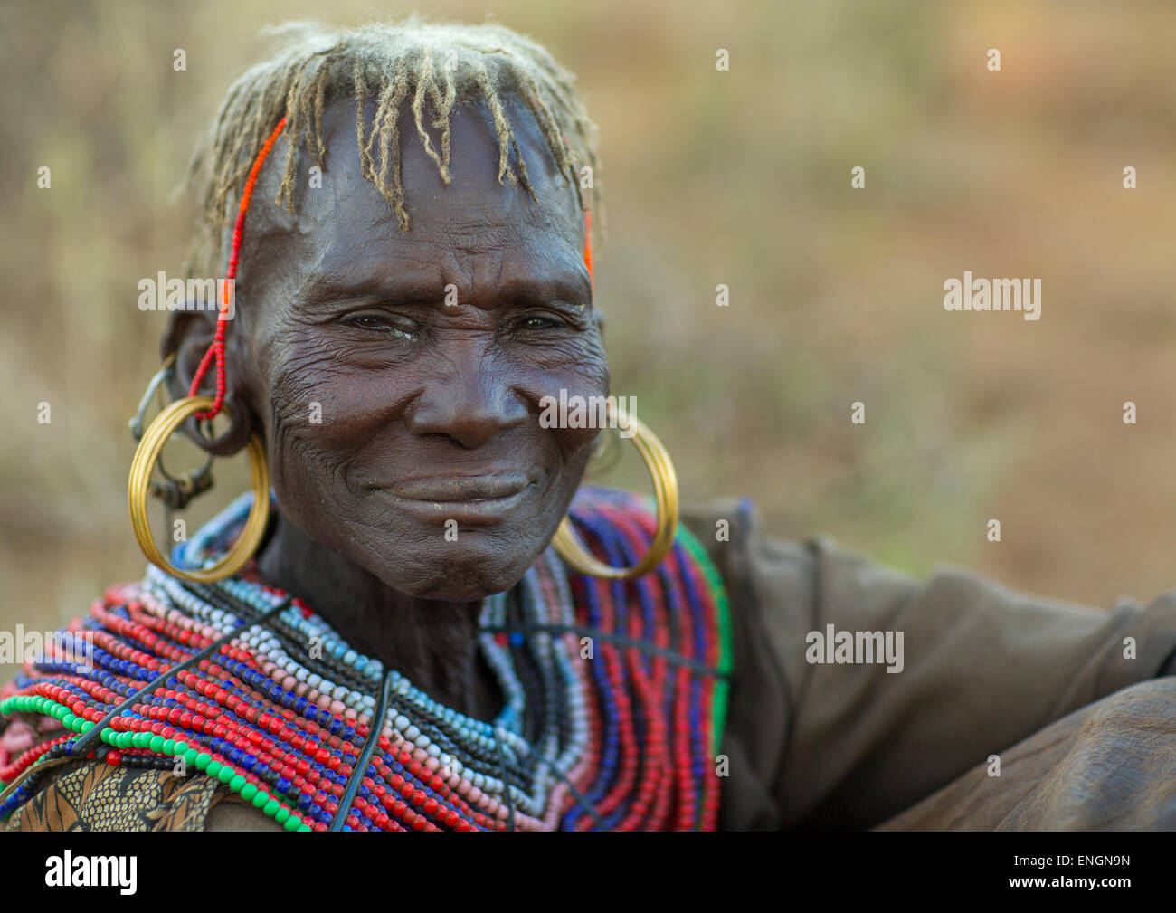 A Pokot Woman Wears Large Necklaces Made From The Stems Of Sedge Grass ...