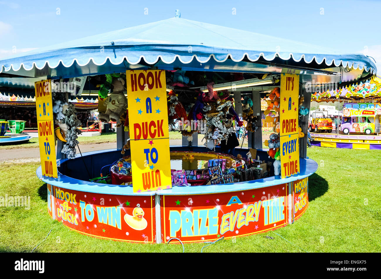 "Hook a Duck" fairground attraction where people can win prizes Stock