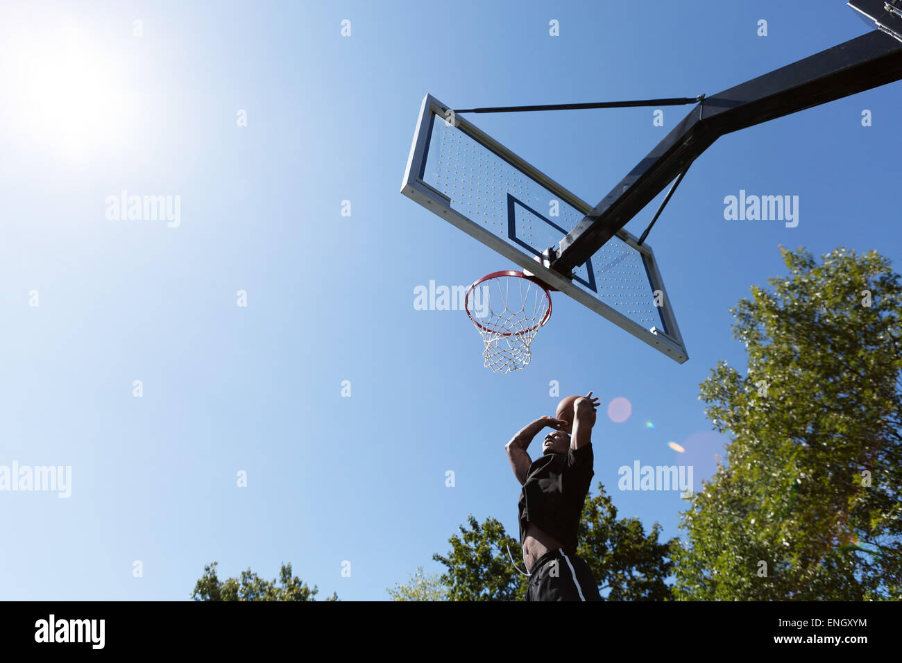 Basketball Dunk Outdoors Stock Photo