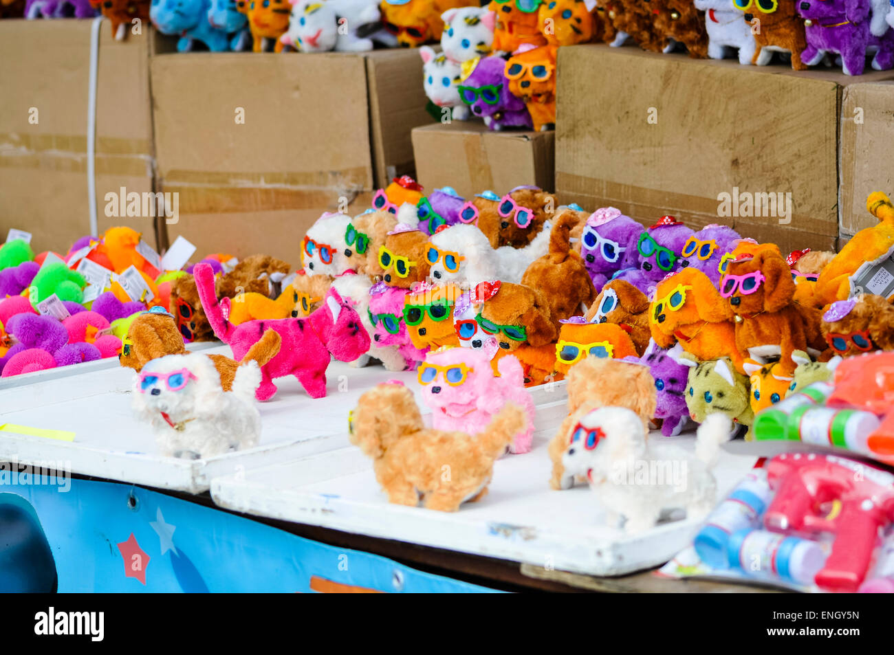 Colourful toy barking dogs on sale at a shop Stock Photo