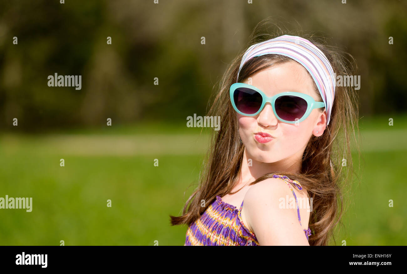 portrait of a pretty young girl with sunglasses Stock Photo - Alamy