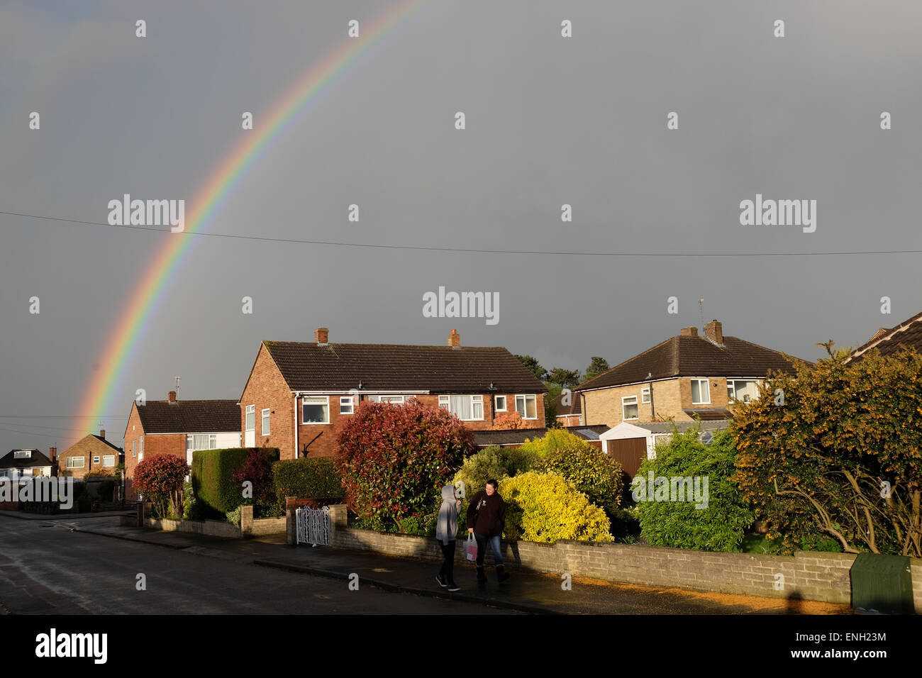 Rainbow appears after a heavy rain shower in loughborough Stock Photo