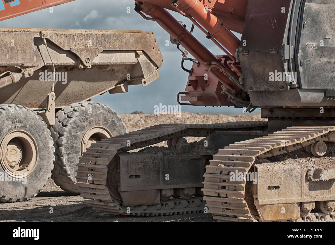 Construction equipment on pebble beach Stock Photo