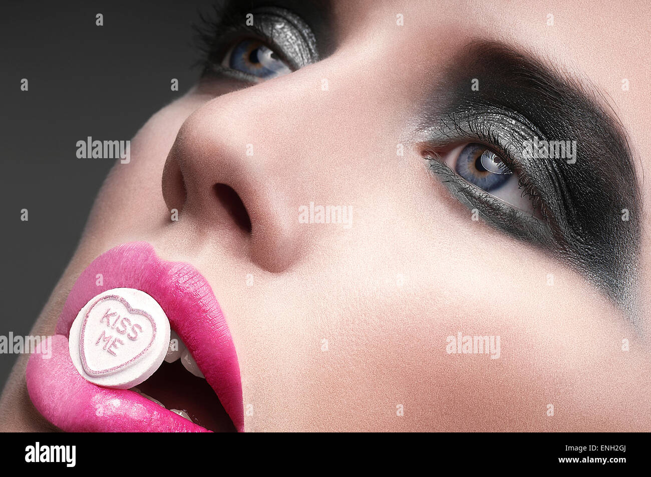 Kiss me sweet in mouth cropped beauty close-up Stock Photo
