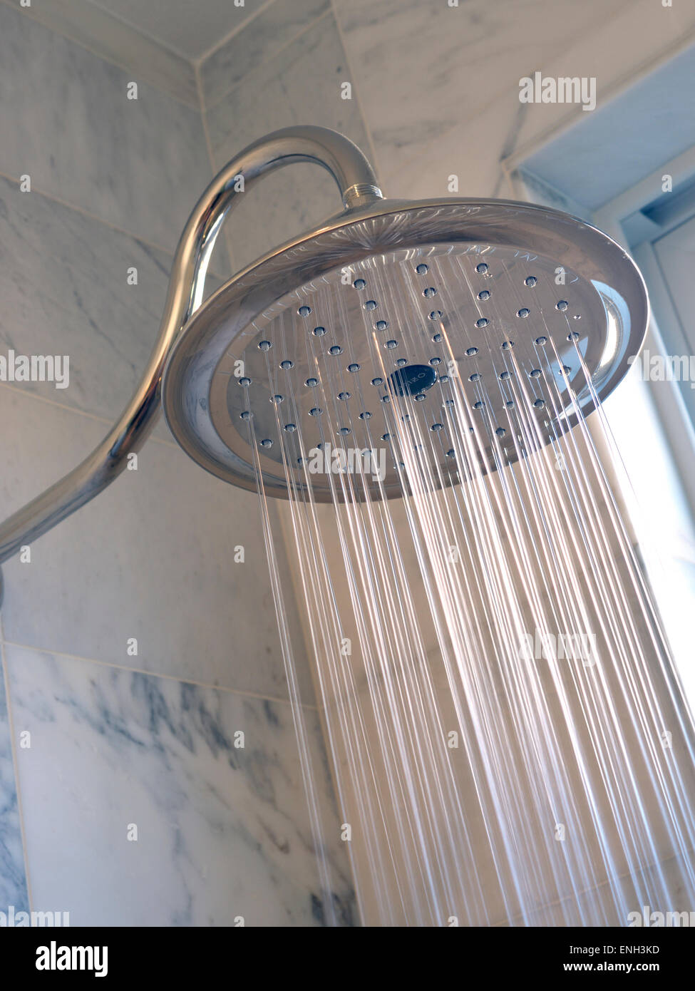 Shower Head luxury 'Monsoon' with sunlit water flow in marble bathroom