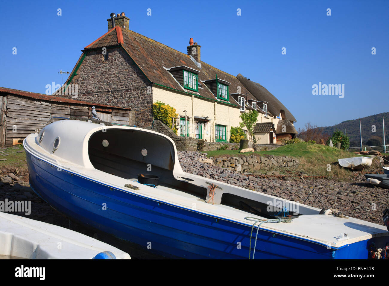 17th Century Gibraltar Cottages overlooking the small tidal harbour at Porlock Weir in West Somerset Stock Photo