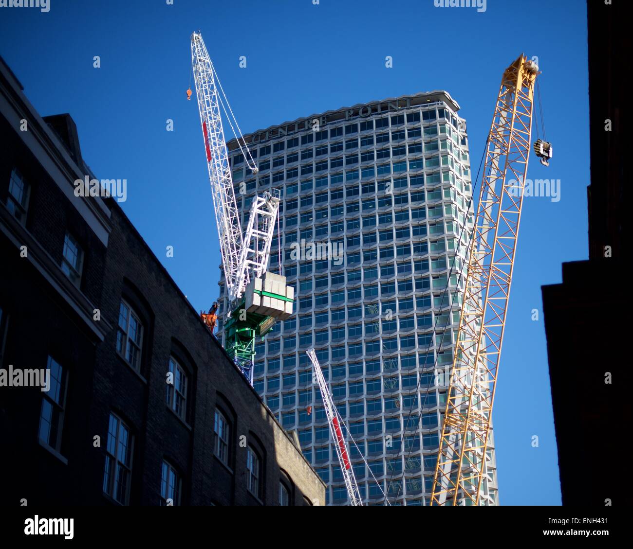 Centrepoint from Soho Square London with cranes Stock Photo