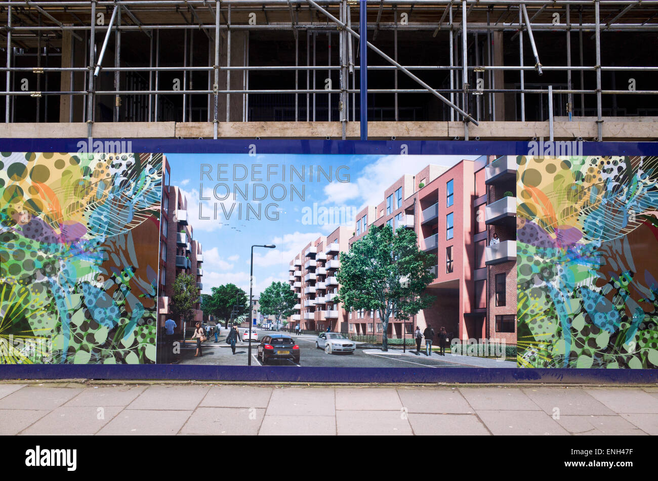 CGI of a new housing development on panel boards surrounding the construction site, London, England, UK Stock Photo