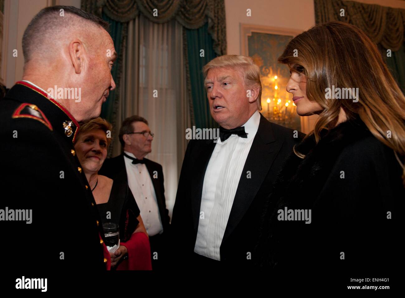 U.S. Marine Corps Gen. Joseph F. Dunford, Jr. chats with Donald Trump during the 20th Annual Semper Fidelis Gala dinner April 22, 2015 in New York City. President Obama announced May 5, 2015 that Dunford will become the new Chairman of the Joint Chiefs. Stock Photo