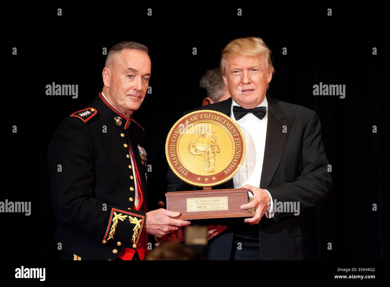 U.S. Marine Corps Gen. Joseph F. Dunford, Jr. and with Donald Trump presents the Marine Corps-Law Enforcement Foundation awards during the 20th Annual Semper Fidelis Gala dinner April 22, 2015 in New York City. President Obama announced May 5, 2015 that Dunford will become the new Chairman of the Joint Chiefs. Stock Photo