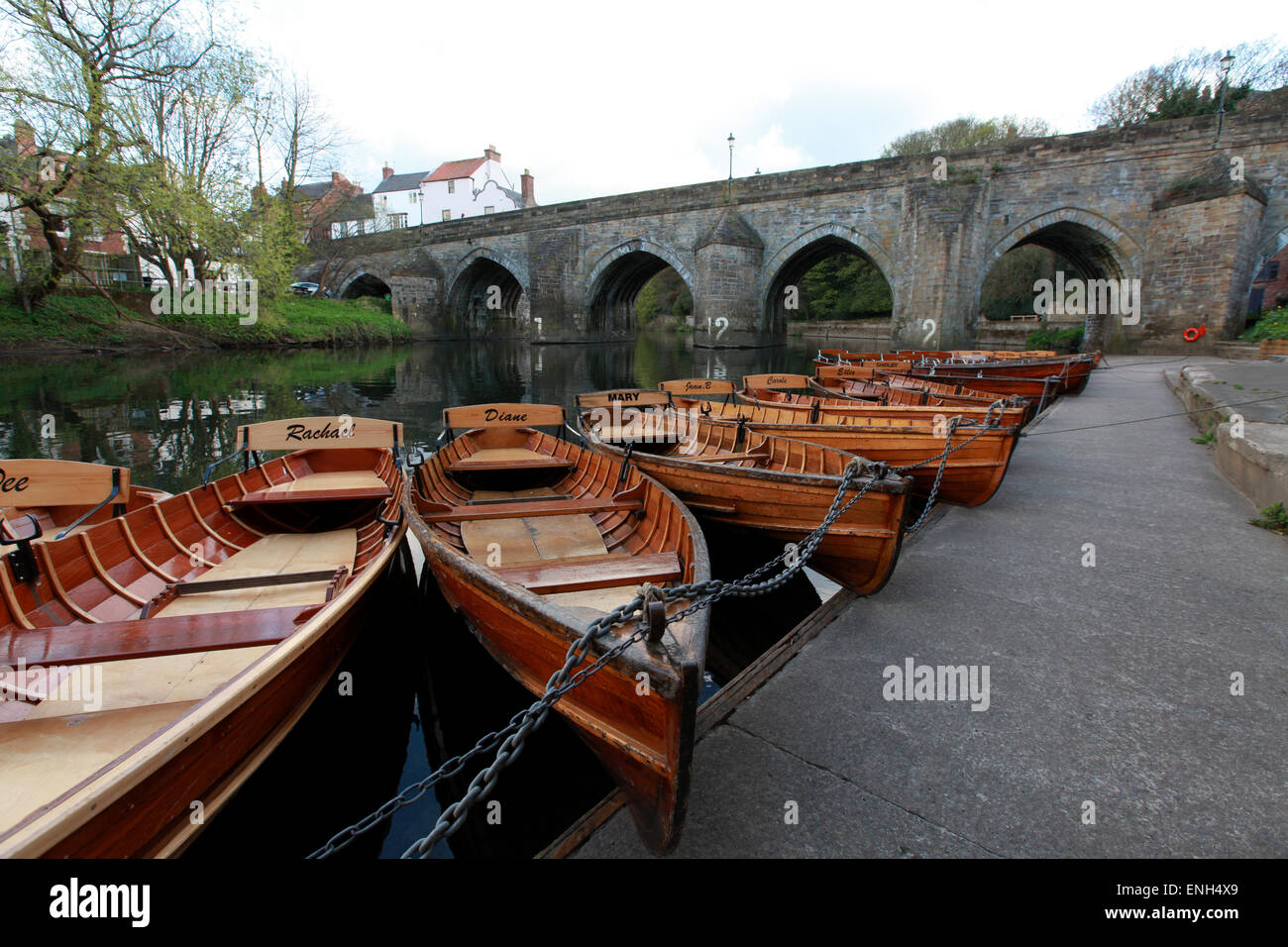 Tradition wooden rowing boats on the River Wear with Elvet Bridge in the Background in Durham Stock Photo