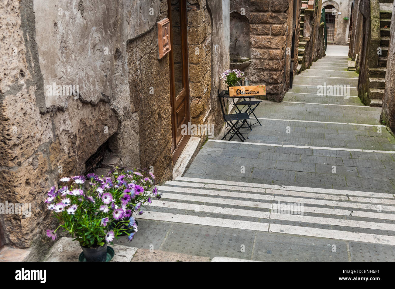 Descending stone steps in Pitigliano, Grosseto Province, Italy Stock Photo