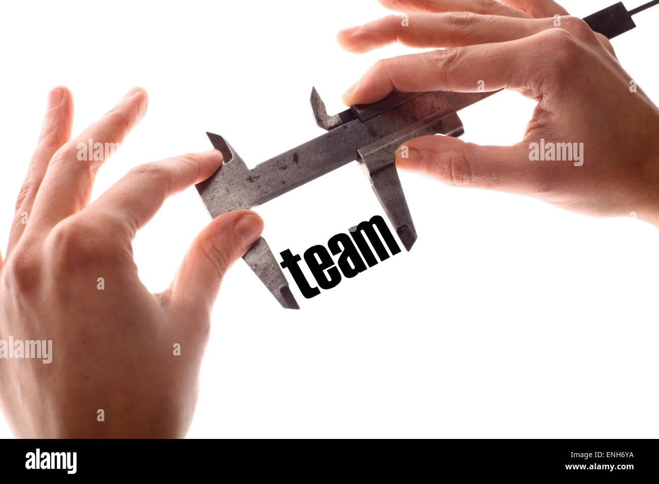 Color horizontal shot of two hands holding a caliper and measuring the