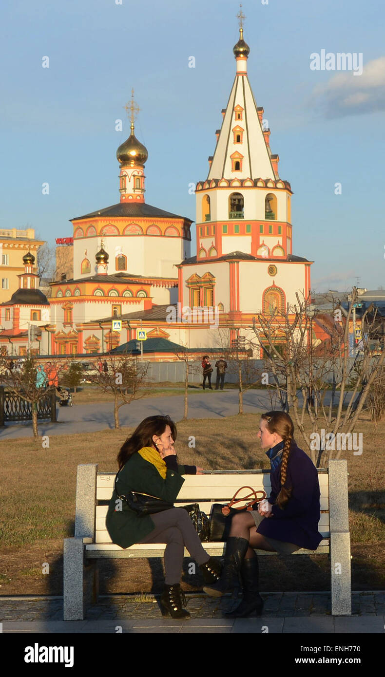 Russian women enjoying the spring weather by the Bogoyavlenski (The Epiphany) cathedral in Irkutsk. Stock Photo