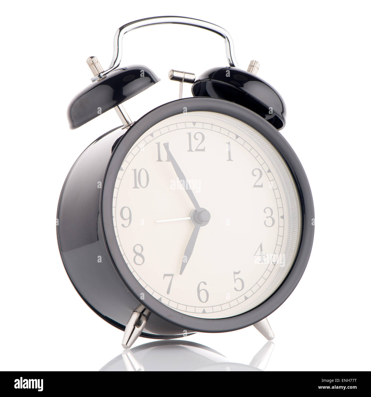 Old fashioned alarm clock on white background Stock Photo - Alamy