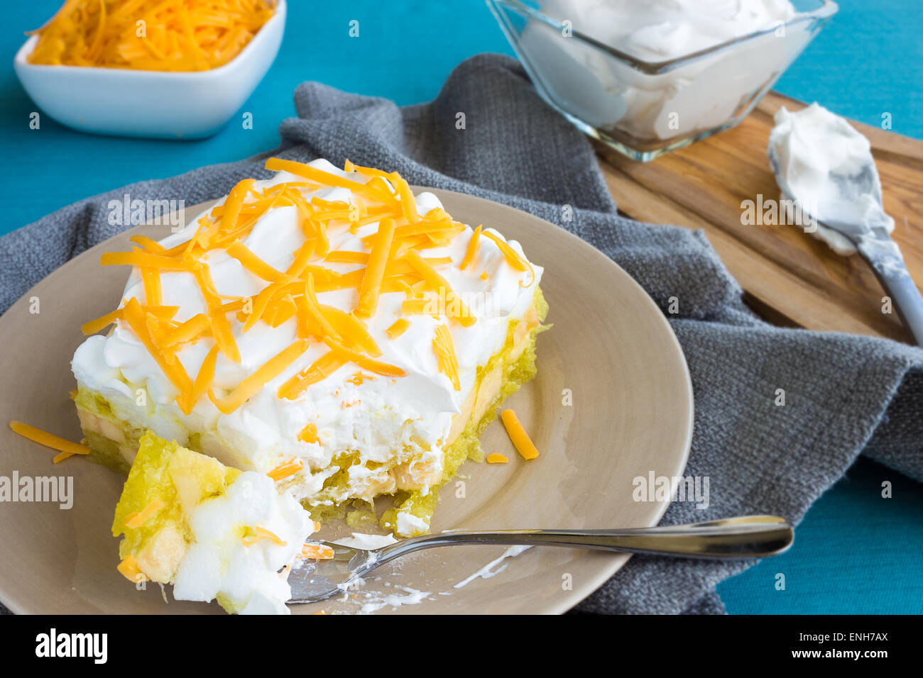 Hawaiian salad made with lemon jello, pineapple, banana, mini