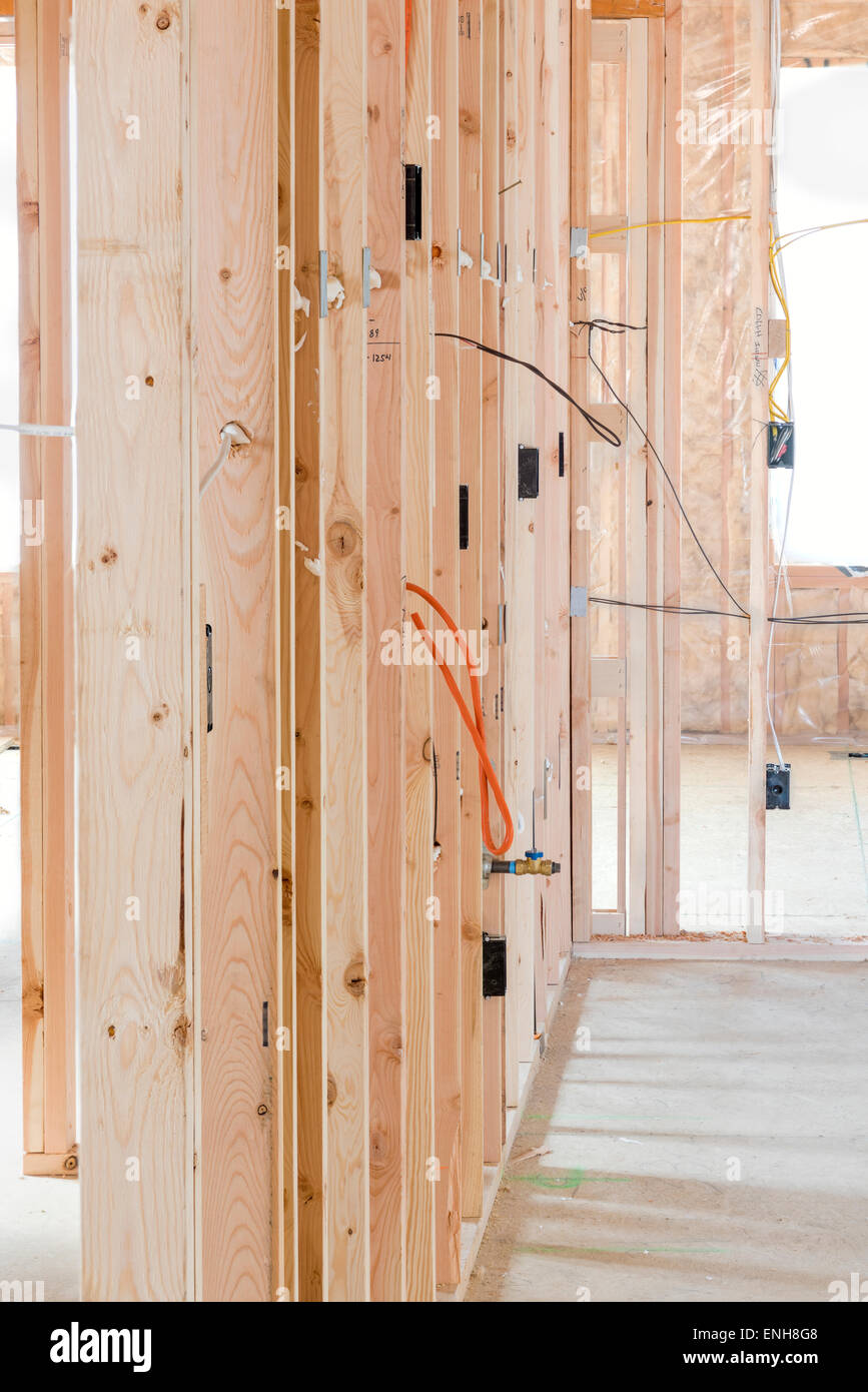New home construction wood studs and electrical Stock Photo