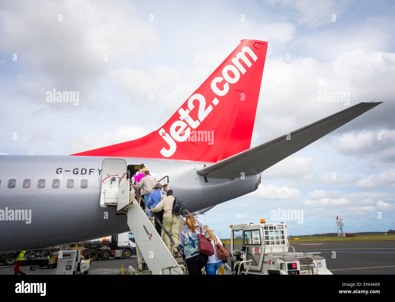 Passengers boarding flight at Newcastle Airport, England, UK