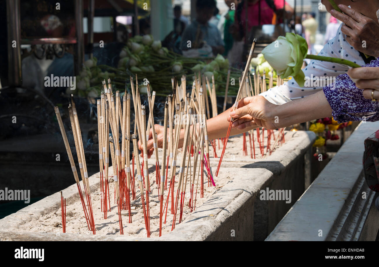 Lighting incense sticks bangkok hi-res stock photography and images - Alamy