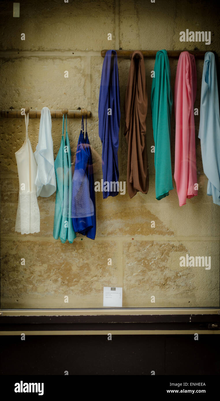 Clothes hanging in shop window, high end fashion, luxury Stock Photo - Alamy