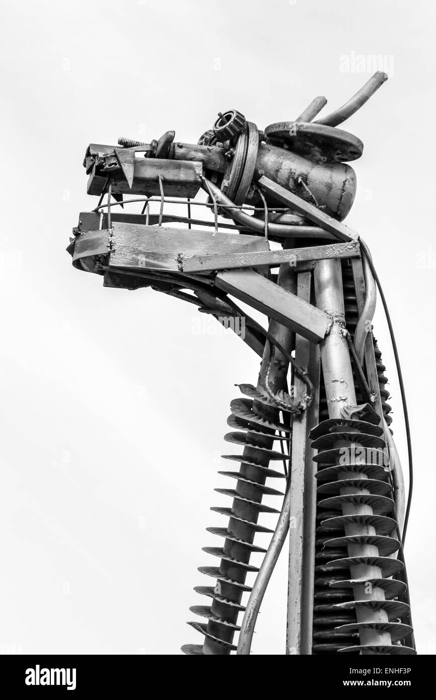 Various scrap metal welded together to create a cow head in monochrome Stock Photo