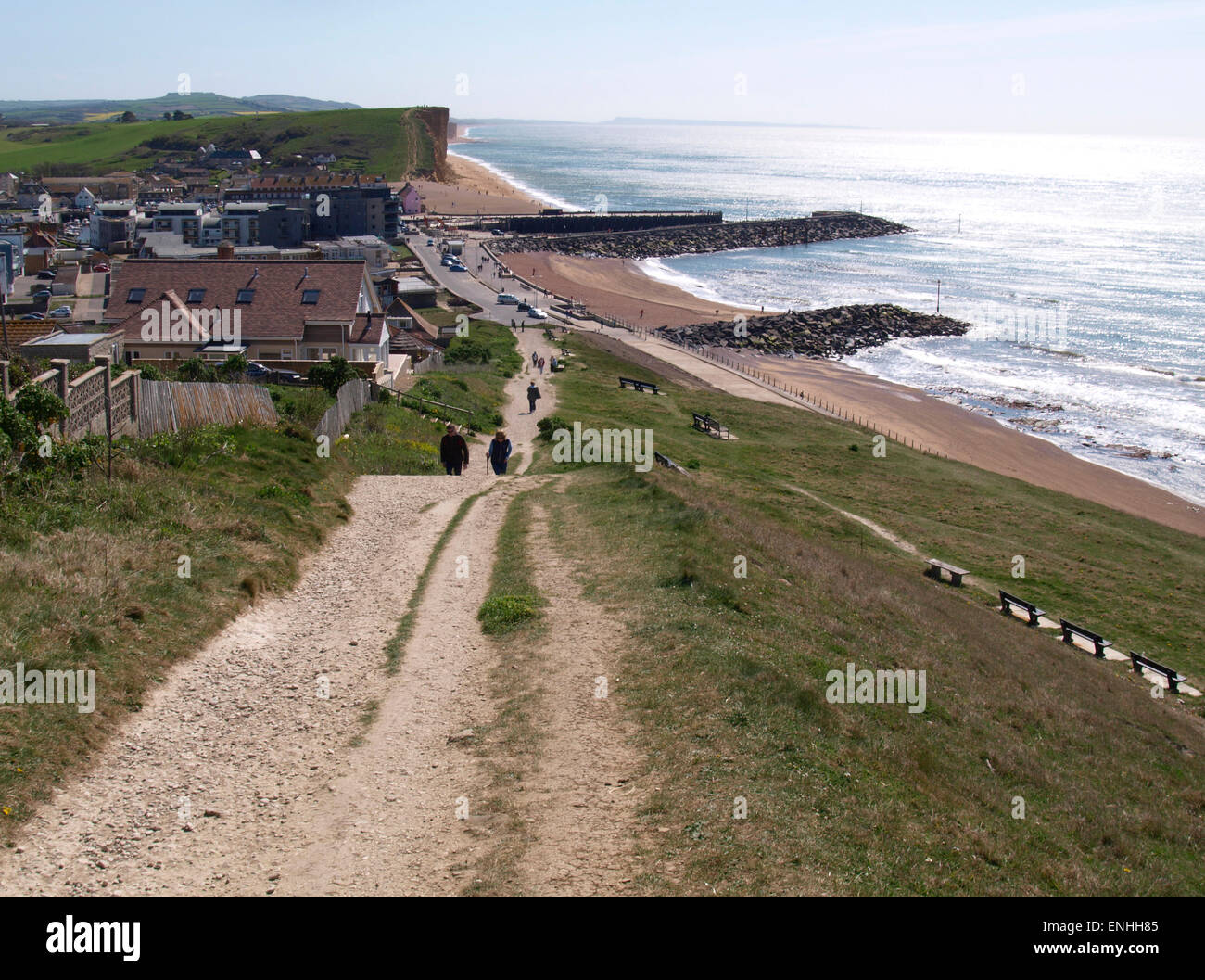 South West coast path heading into West Bay, Dorset, UK Stock Photo