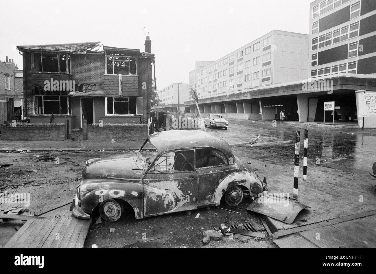 Aftermath of the riots which broke out in the Broadwater Farm estate in Tottenham, North London. The riot started the day after local resident Cynthia Jarrett died during a disturbance while police searched her home. Picture shows a burnt out car in the B Stock Photo