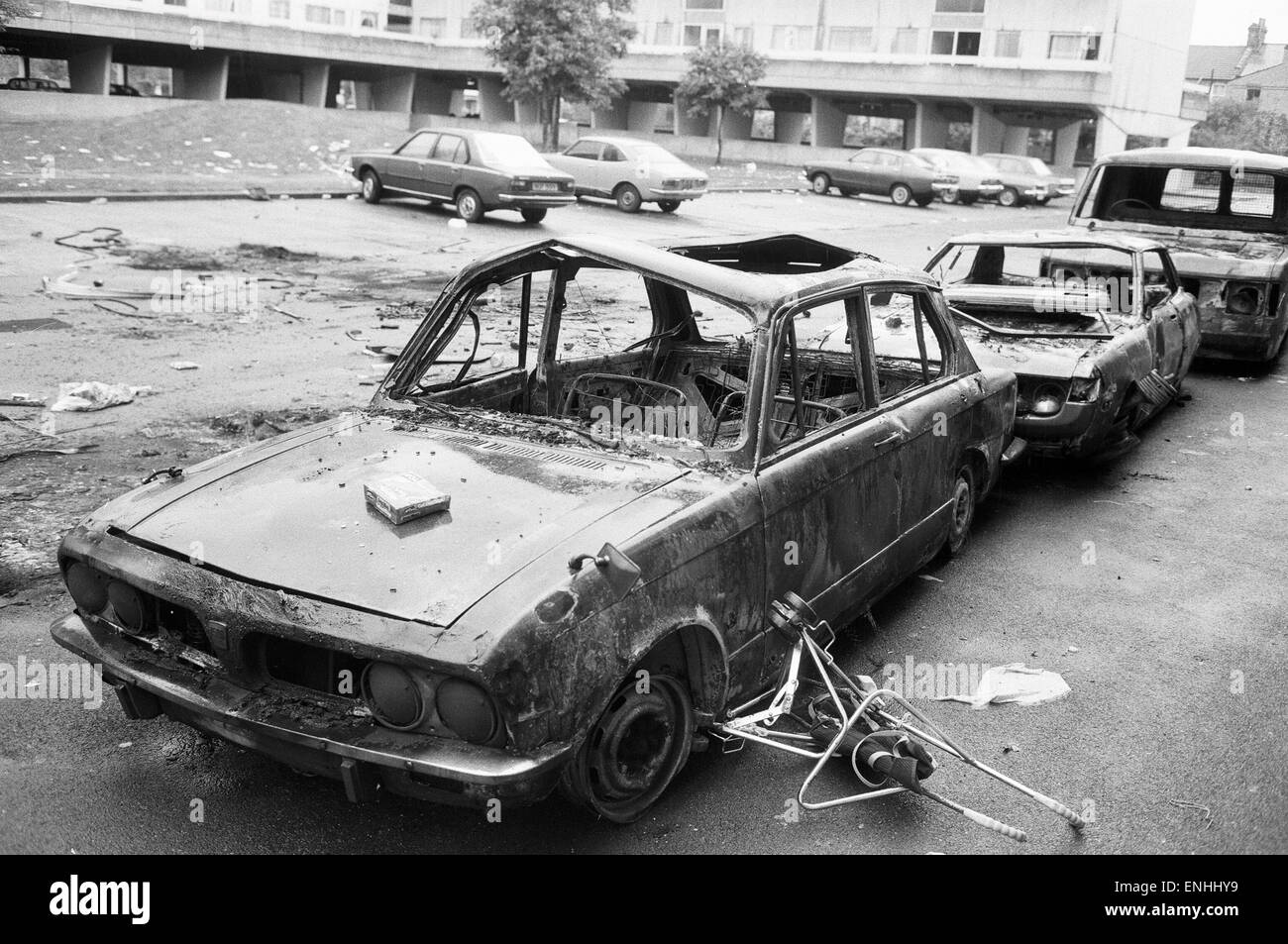 Aftermath of the riots which broke out in the Broadwater Farm estate in Tottenham, North London. The riot started the day after local resident Cynthia Jarrett died during a disturbance while police searched her home. Picture shows burnt out cars the day f Stock Photo