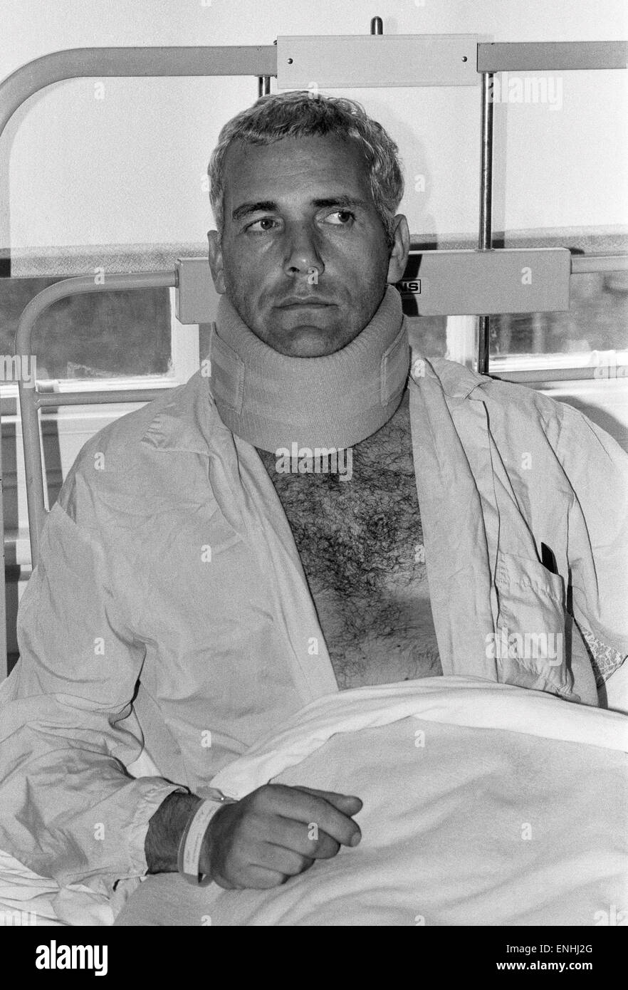 Police Sergeant Dennis Dorrington in Whittington Hospital with his neck in a collar, after he was injured in the Broadwater Farm riot in Tottenham, North London. 7th October 1985. Stock Photo