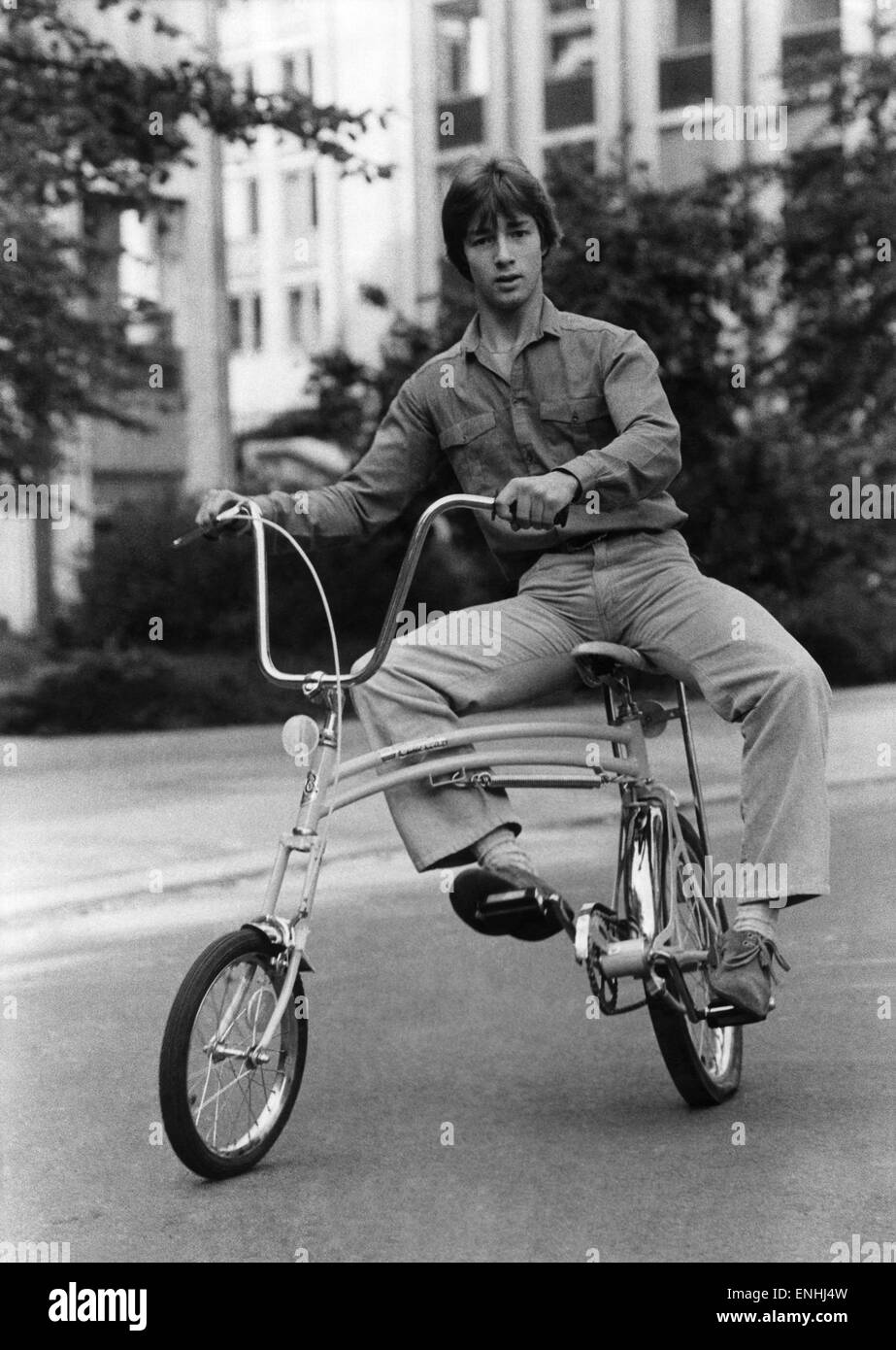 Safety experts are up in arms over a new-style 'fun' bike which they say is a danger to children. They're report about the American-designed Swing Bike, a trick cycle being publicised by singers The Osmonds as 'a new fun-filled experience for British kids Stock Photo