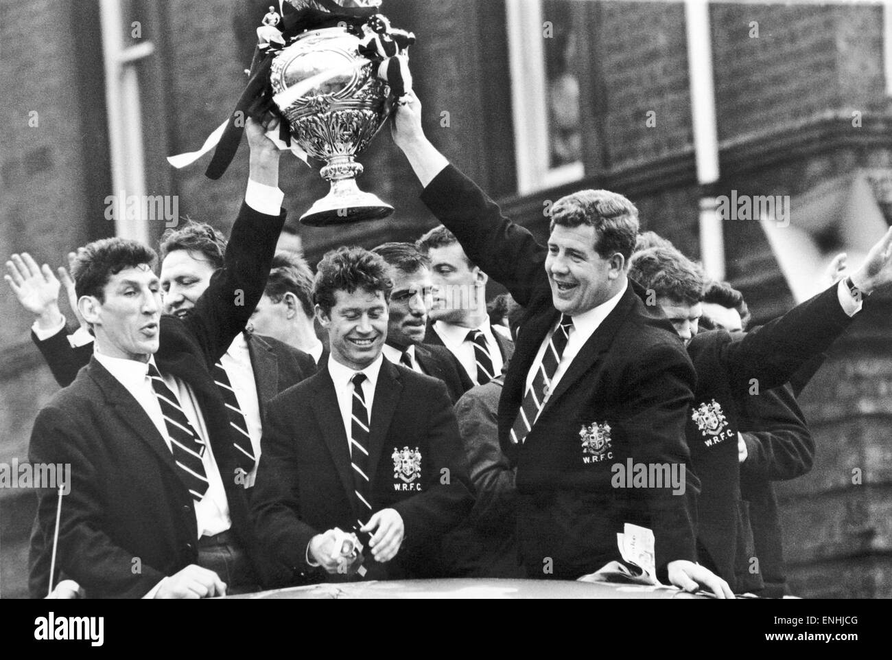 Holding the cup aloft are Captain Vince Karalius (left) and Lance Todd trophy winner Frank Collier during Widnes civic reception following their victory over Hull Kingston Rovers in the Rugby League Cup Final 11th May 1964 Stock Photo