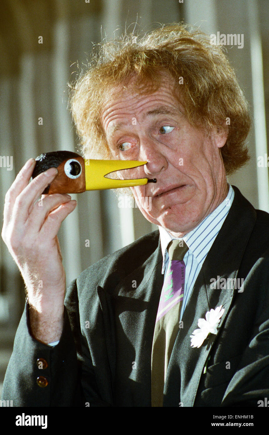 Rod Hull seen here with a miniature head of his feathered partner Emu. 12th January 1993 Stock Photo