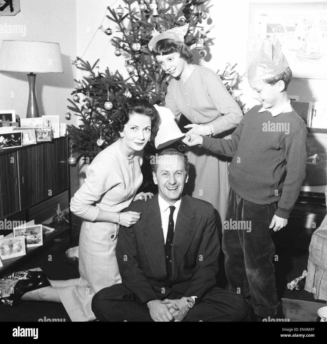 Tv presenter Hughie Green seen here at home at Christmas time with his ...